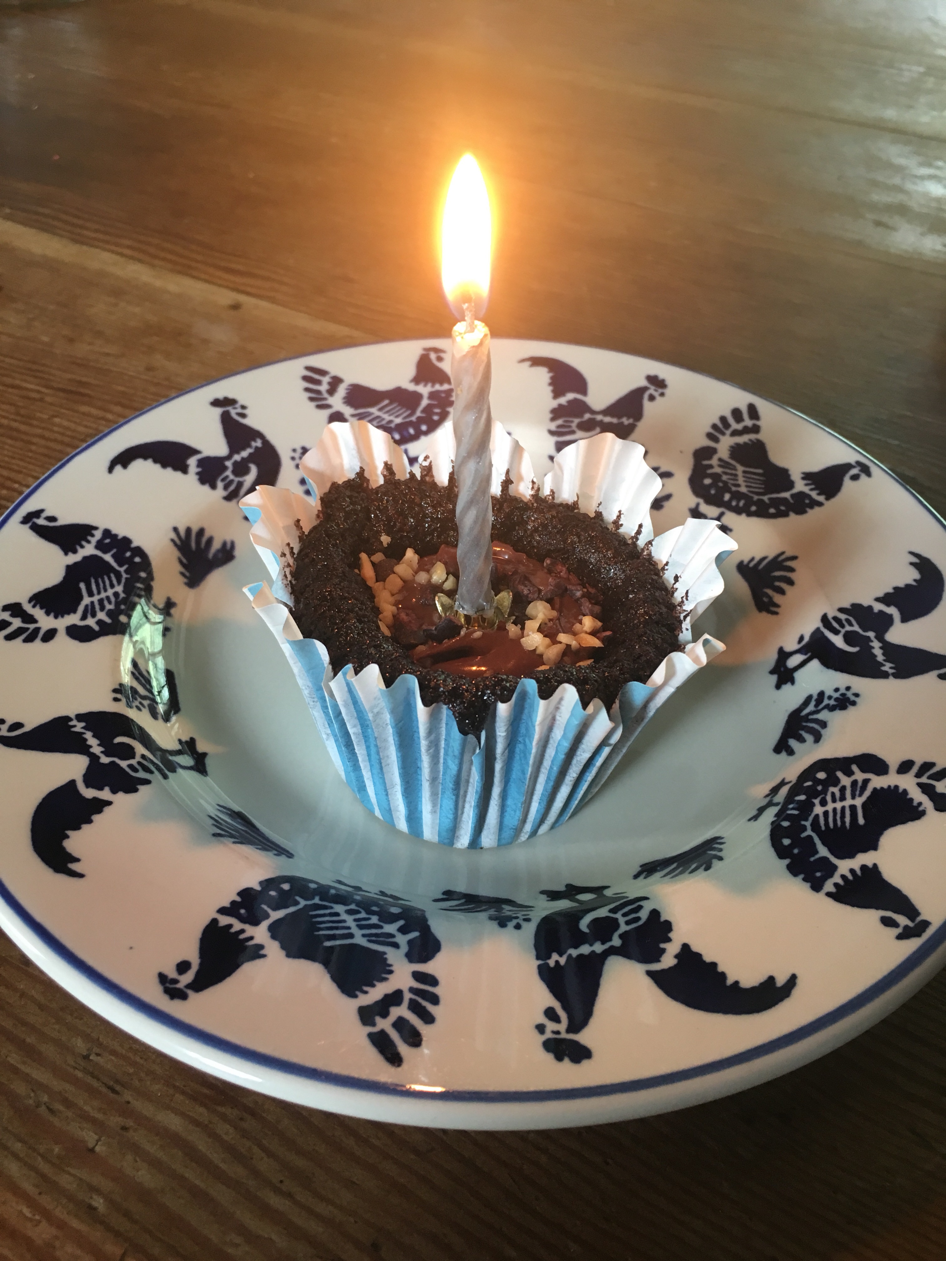 Vegan choc cupcake with candle